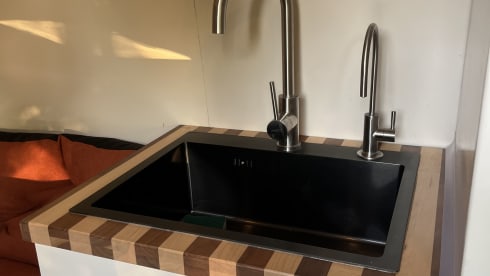 Albatros – The ultimate off-grid camper van: indoor shower, electric cooking and more