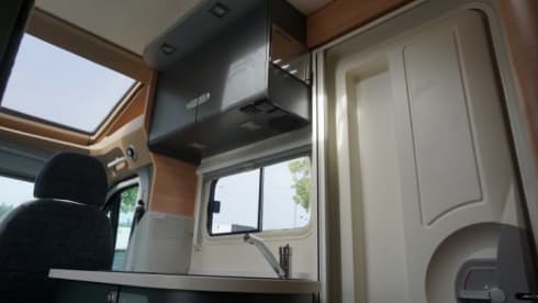 Nice compact 2 person camper with single beds.