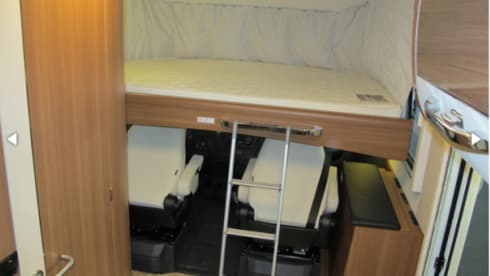 LMC Integral Camper with round seating layout
