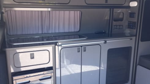 Harvey  – 2 berth VW High-Top LWB Campervan AC