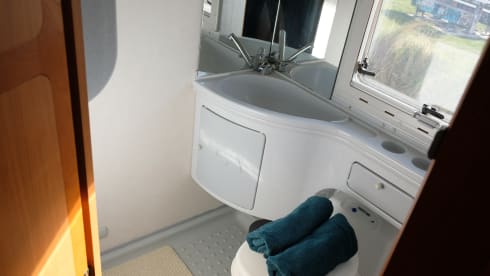 Adria Mobil alcove with 6 belts