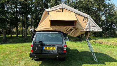 The Brick  – Volvo station Polar 245 roof tent incl complete camping equipment
