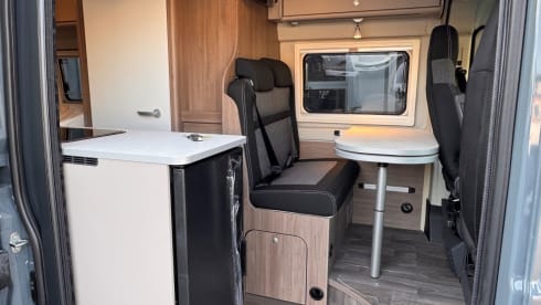 Buzzie – Brand new 4 person bus camper Carado 