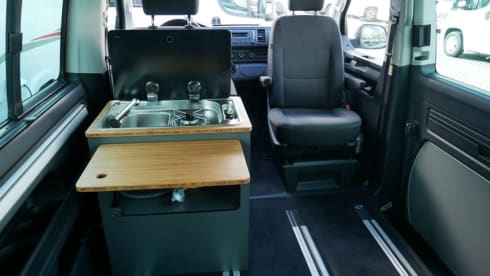 nice VW T6 Multivan with wide bed, pop-up roof, automatic