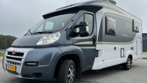Joep – Luxe Bürstner camper > KINGSIZE BED  (TV-AIRCO-VRIJE KM)