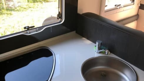 Luxury 4p Ford Kronos Roller Team 2021 for rent – Travel in comfort!