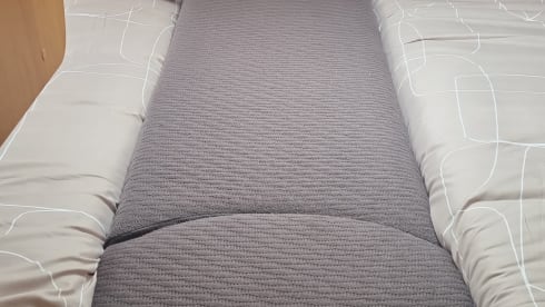 Zilveren parel. – Burstner with 2 x length bed and large dinette.