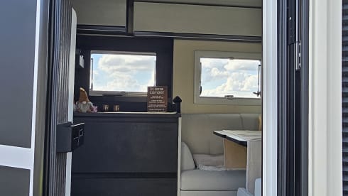 Luxury 4-person motorhome with bicycle rack and tow bar, model 2026