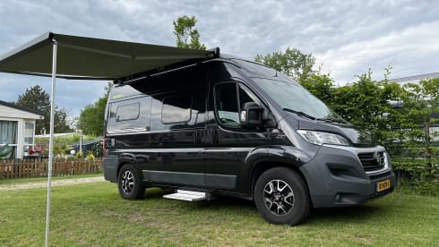 Super cool Hymer Ayers Rock bus camper for 2 people