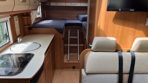 2p Carado semi-integrated from 2013 with single beds. 