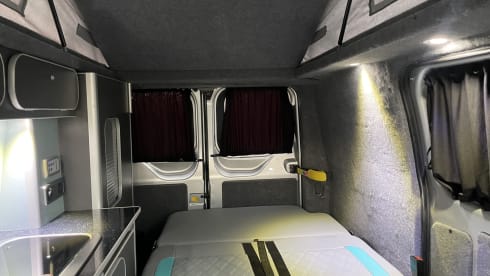 The Fun Bus – 4 berth Ford Transit campervan with Pop-Top