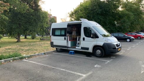 Compact off-grid Peugeot Boxer with length bed for 2 people