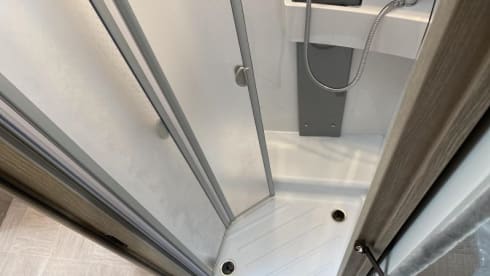 Enjoy comfort and freedom with this new semi-integrated camper