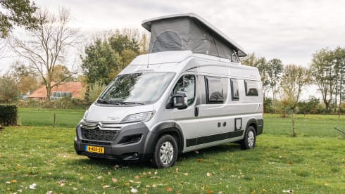 Fijnja – Luxury 4 pers. Pössl bus camper with sleeping lifting roof from 2019