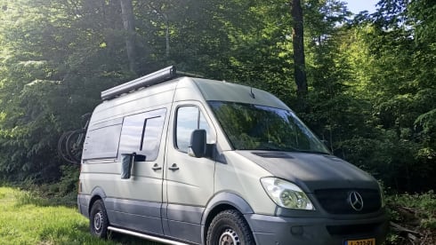 Luxury off-grid Sprinter with unique, bohemian interior! Winter camping