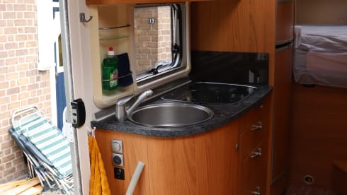 Camper with top layout