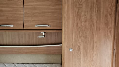 Comfortable motorhome with queen bed and electric bicycle carrier 