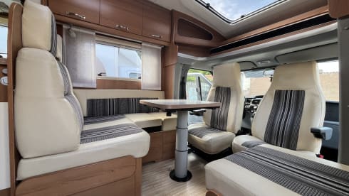 4p LMC semi-integrated with awning, air conditioning and cruise control.