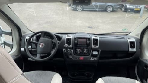 Spacious, well-equipped Chausson Titanium 728 EB motorhome for rent