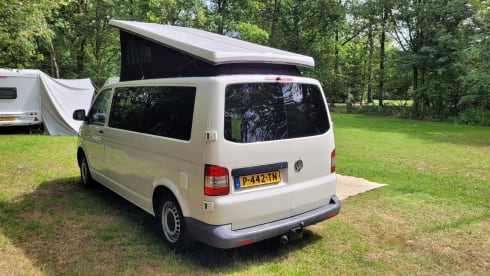 4-person Volkswagen with pop-up roof and long wheelbase for extra space