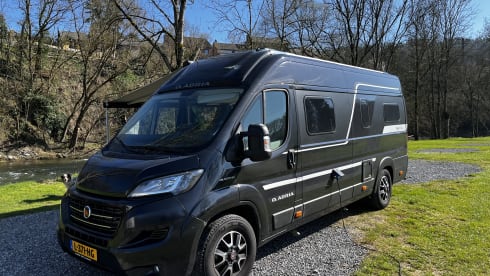 Fiat Adria 640 bus camper with large garage and fold-down bed 