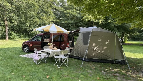 Super nice Volkswagen Caddy Maxi campervan from 2011 with tent, 4p