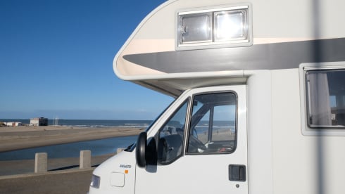 Adria Mobil alcove with 6 belts