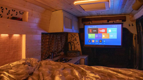 Adventurous camper van with on-board cinema and "Stealth Mode"