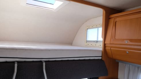 Adria Mobil alcove with 6 belts