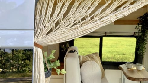 Luxurious off-grid bus from 2021 with a super atmospheric interior 