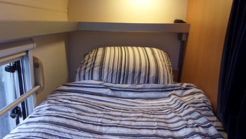 Compact family camper with bunk bed