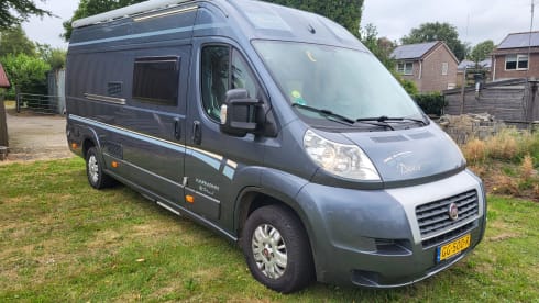 Neat camper van with length beds and solar panels