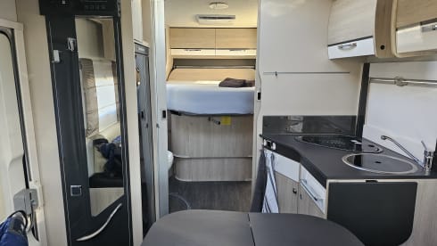 Titanium – Luxury 4 person Camper (extra air conditioning, smart TV, Alpine navigation/radio)