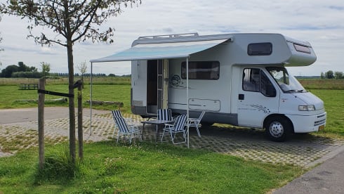 Nice 5 person Dethleffs alcove camper.
