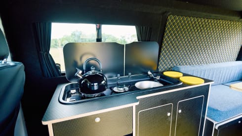 Mellow Yellow – Luxury VW T5 Camper with Large Bed & Luxury Black and Yellow Interior