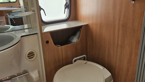 Comfortable motorhome with queen bed and electric bicycle carrier 