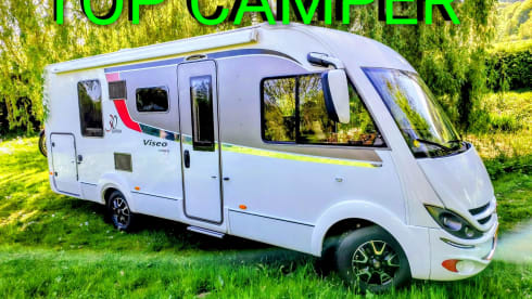 First Class**** – Bürstner with Air Conditioning, Queen Bed, Roadside Assistance Insurance