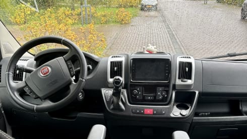 Luxurious off-grid bus from 2021 with a super atmospheric interior 