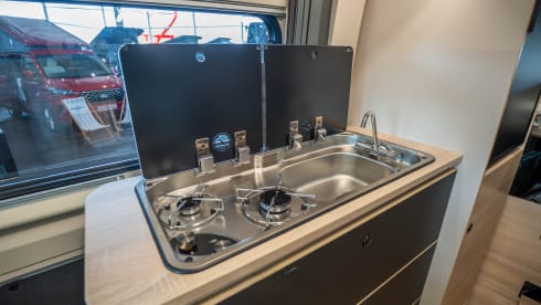 Hotel Kristoffel On the road – 4p Buscamper met hefdak en garage