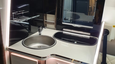 8 – luxury 4 person mclouis Carat 2022 with fixed bed in the back