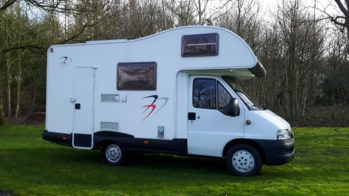 Spacious Fiat 2006 with a fixed bed, air conditioning and a very cozy interior.