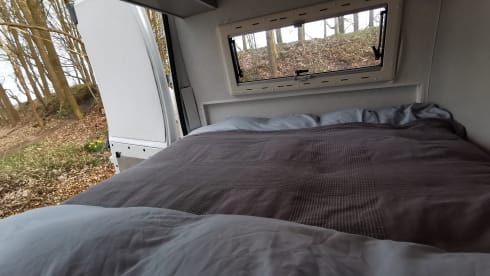 On an adventure with a reliable bus camper.