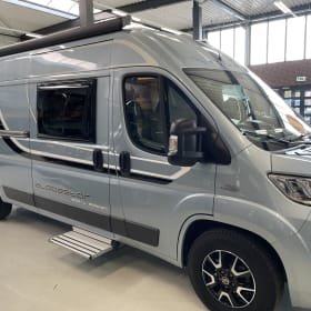 Bus camper Globecar 600L with length beds, for 2 people. Dog allowed.