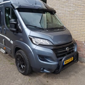 vakantiehuisje op 4 wielen – 2p Karmann bus, met airco in woongedeelte