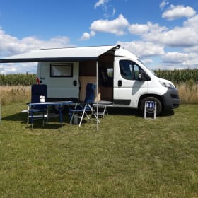 Nice Pössl camper van with comfortable bed