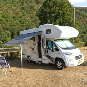 Adventurous and comfortable 2 person alcove camper
