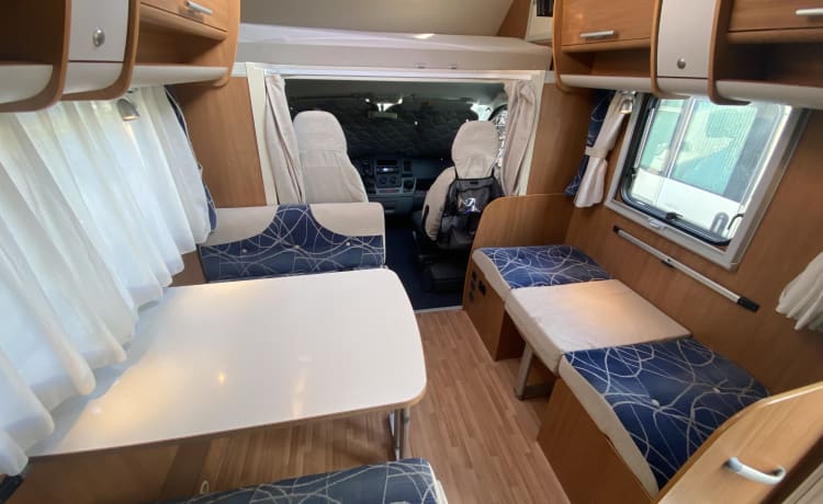 Cel4night – 7-seater overcab motorhome