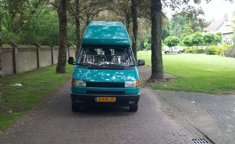 Été -VW T4 California avec toit de couchage fixe