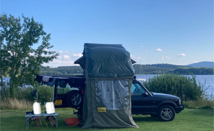 Land Rover Disco II avec tente sur le toit