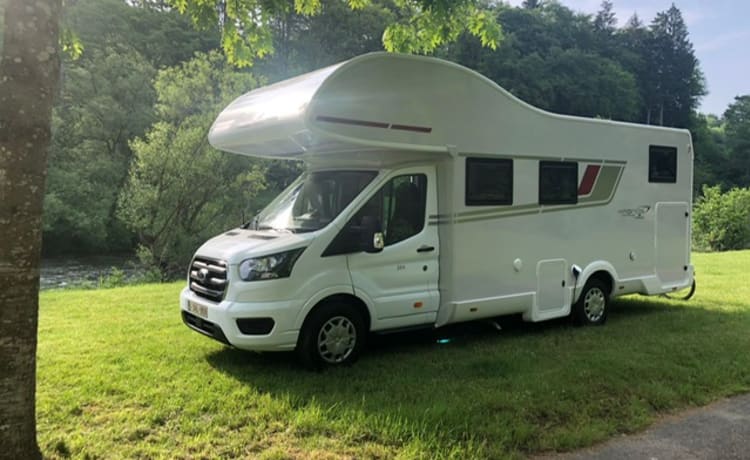 Enjoy traveling with this brand new camper!